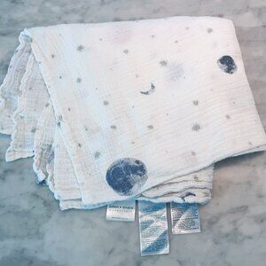 Aden + Anais Essentials Cotton Muslin Swaddle in a planet print